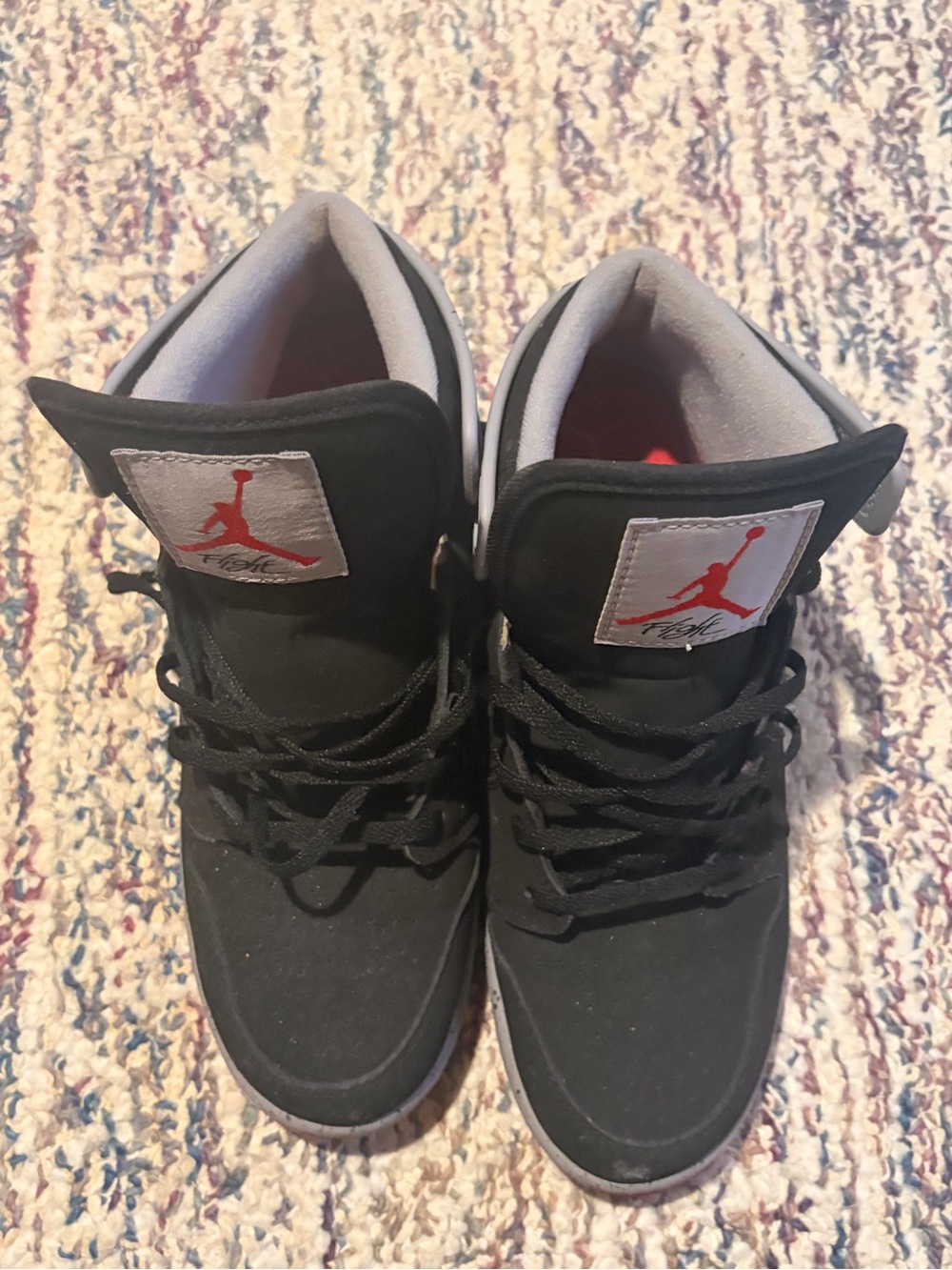 Nike Black High-Top Sneakers with Red Logo